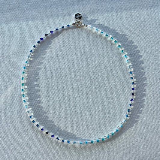 Blue spectrum beads and clear glass cubes beaded necklace with silver clasp and engraved plus charm